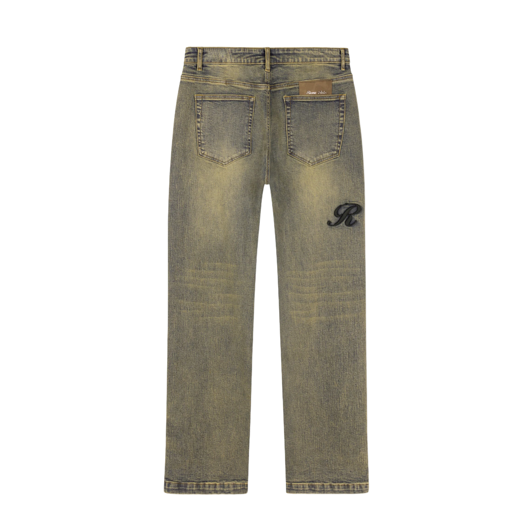RIVERO - RAISED MONOGRAM BUTTONED DENIM JEANS